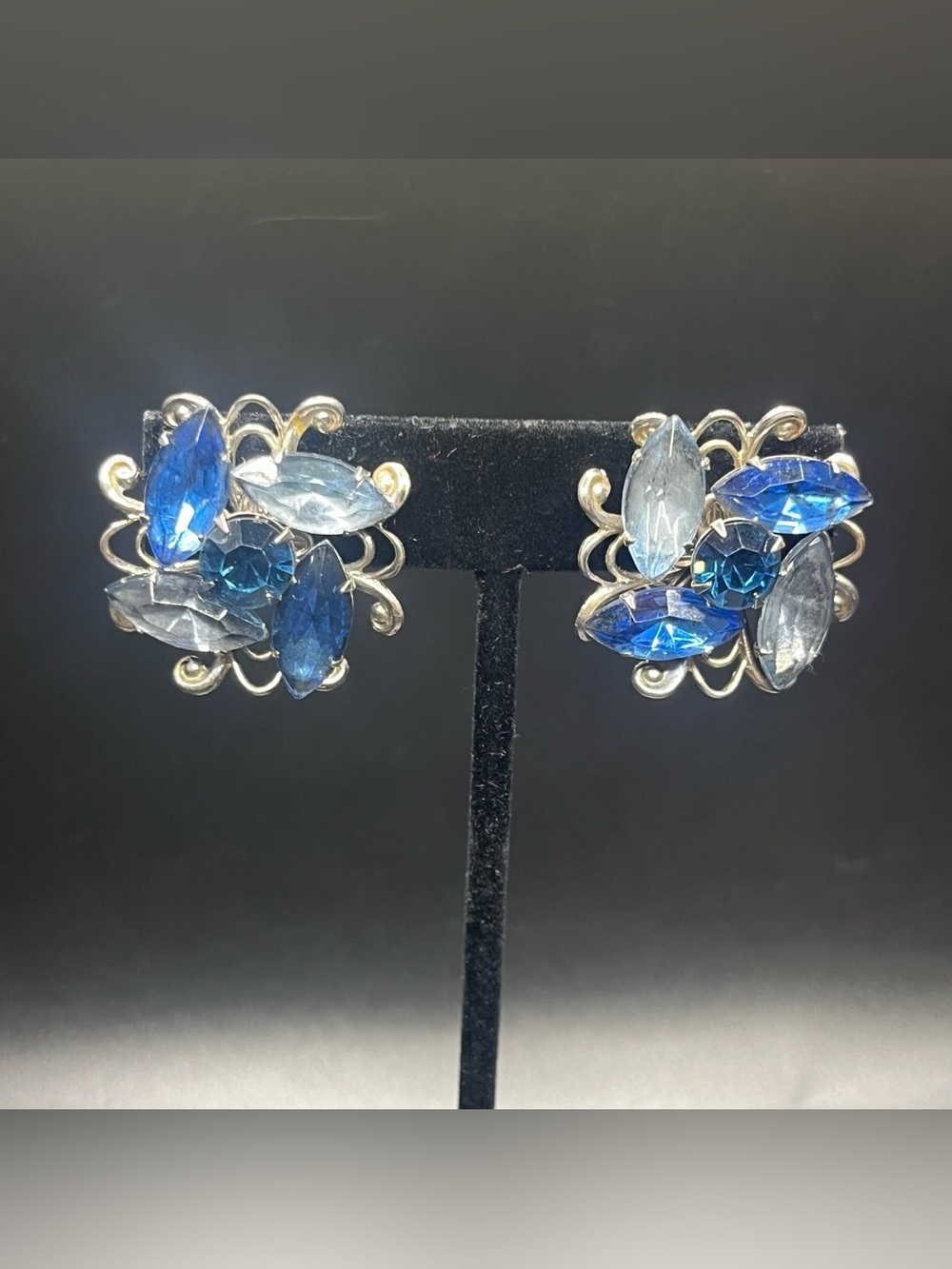 Vintage blue rhinestone clip on earrings silver tone mid century floral scroll